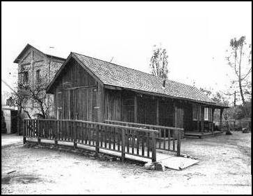 View of office, blacksmith shop, and garage