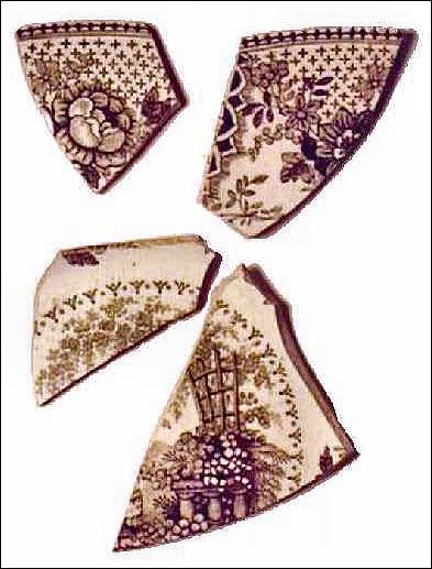 Pieces of brown English transfer print ceramics. Although one was found in 1961 and the others in 1991, they cross-mended to show they were from the same vessel.