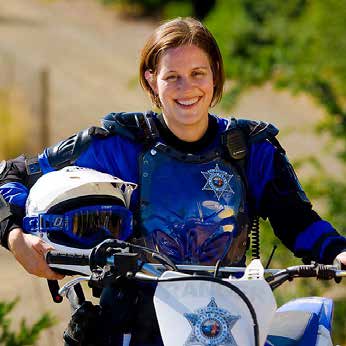 Female California State Park Police Officer with motorcycle