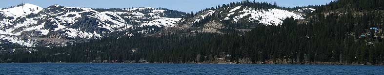 View of Donner Lake shoreline and snow capped mountains at Donner Memorial SHP Thumbnail: View of Donner Lake shoreline and snow capped mountains at Donner Memorial SHP
