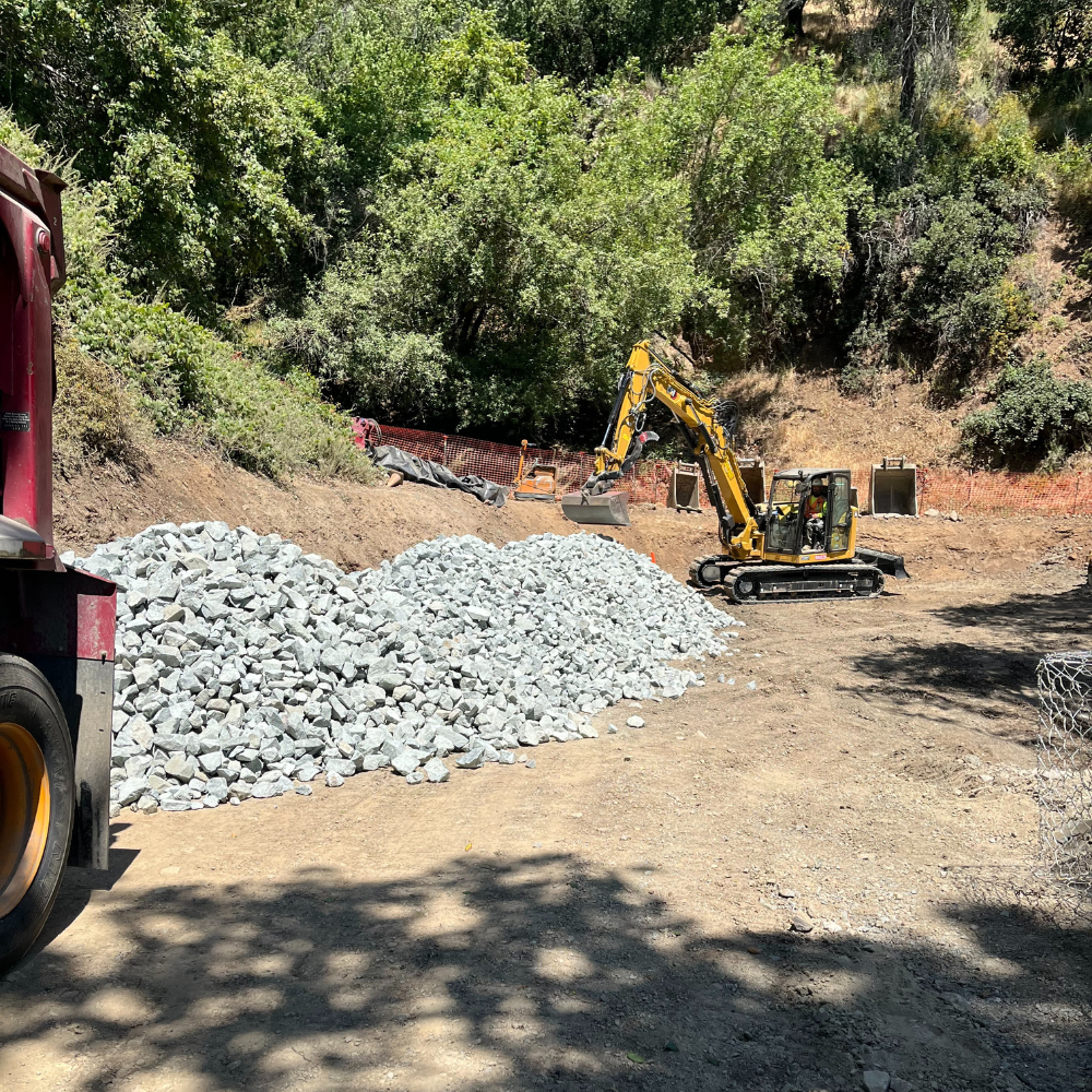 Excavator and rock for the Northgate Project