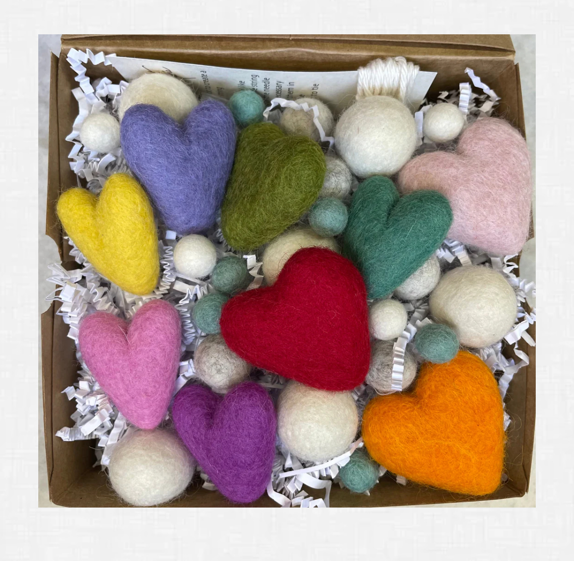 A basket of felted hearts