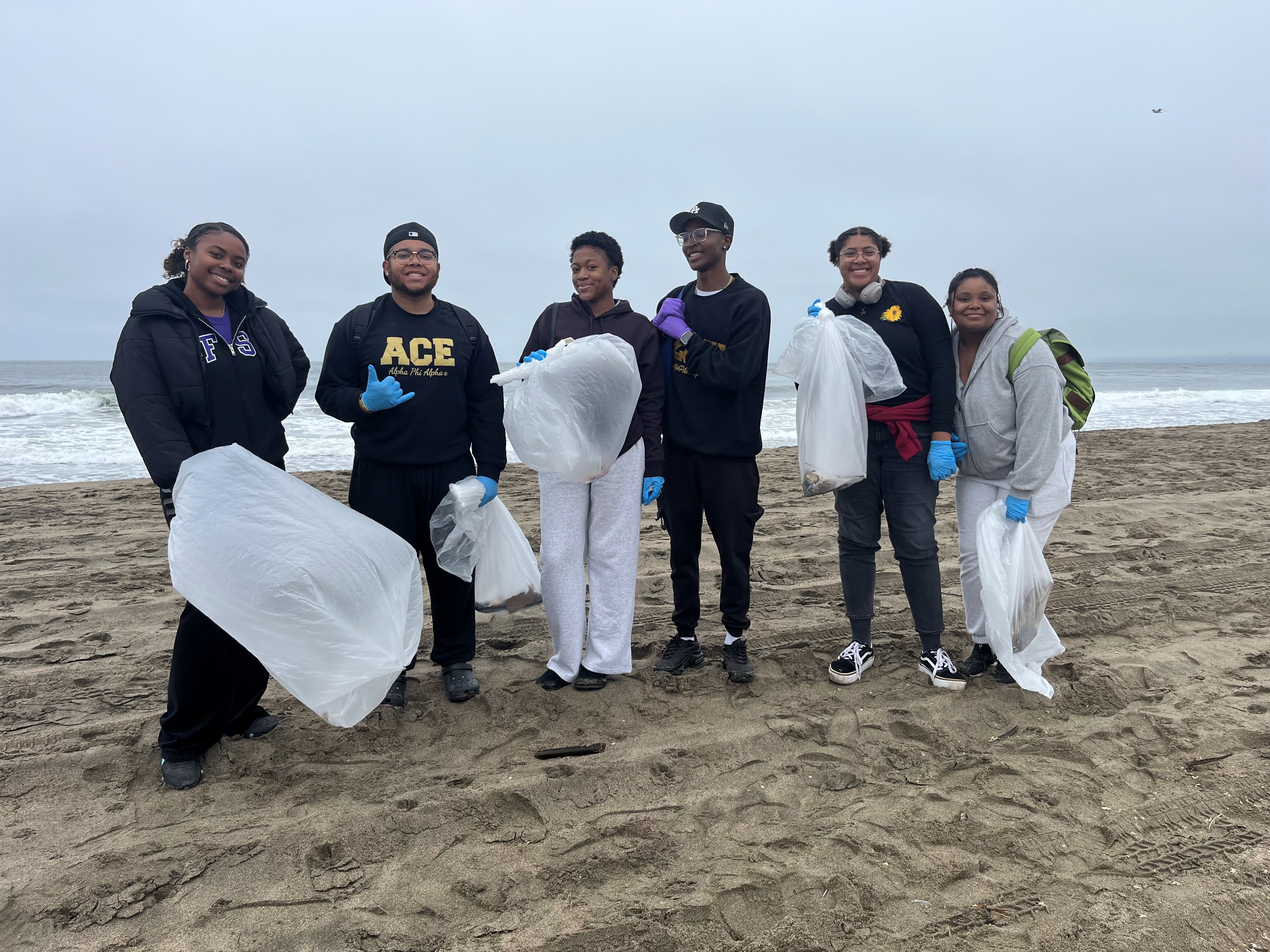 ).                Volunteers with Golden Gate Parks Conservancy help clean up Ocean Beach in San Francisco.  ).                Volunteers with Golden Gate Parks Conservancy help clean up Ocean Beach in San Francisco.