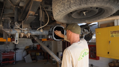Parks worker inspecting differential Parks worker inspecting differential