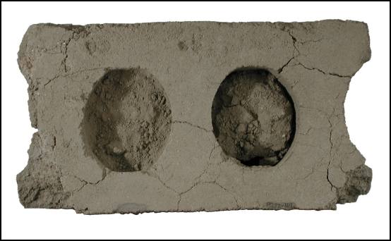 Concrete block recovered from Milner's Barbershop